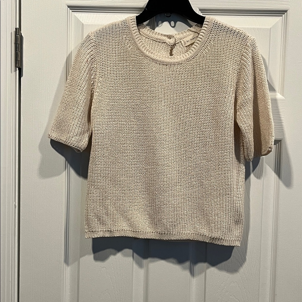 By Together Cream Knit Top Distinctive Opening In The Back with a button closure